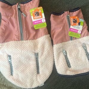 2 cozy coat pet sweaters. Brand new with tags, size small and medium. Bundle